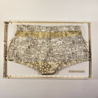 Culotte imprimée gris et doré, taille haute, bords festonnés