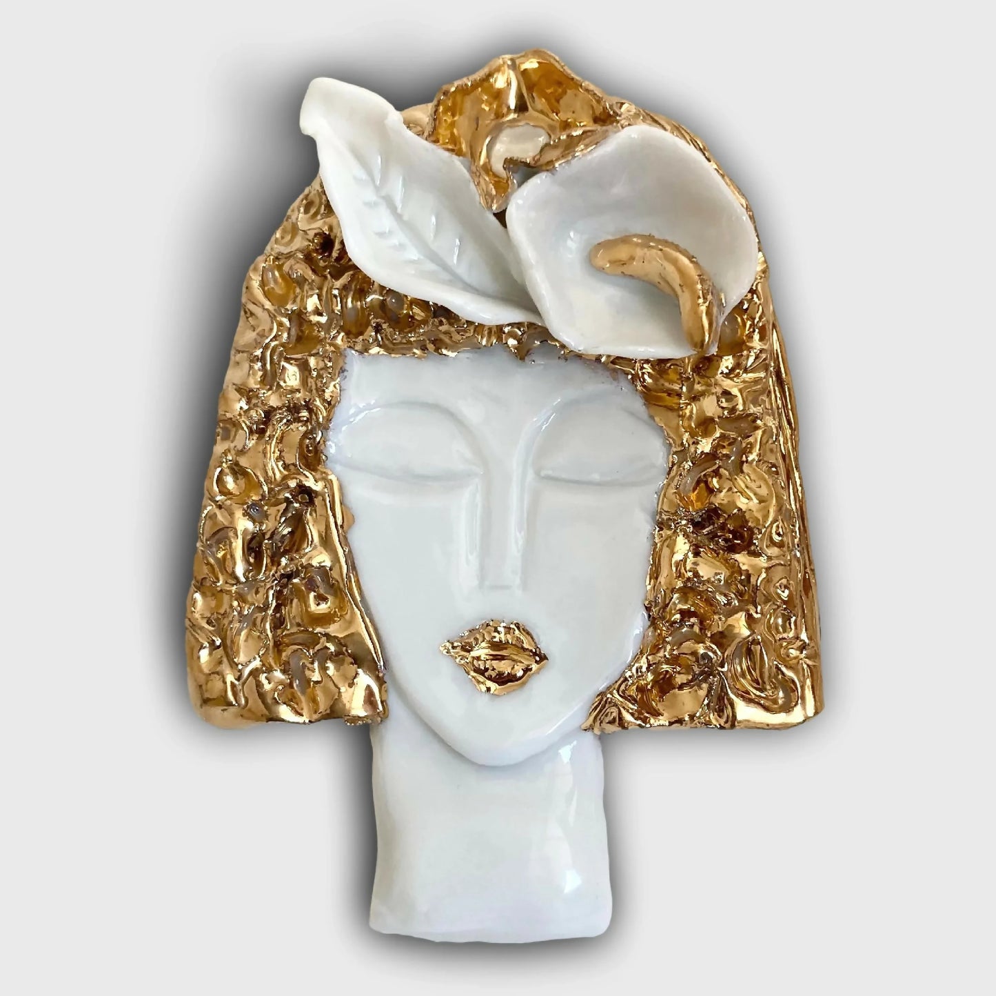 Broche Visage d'or