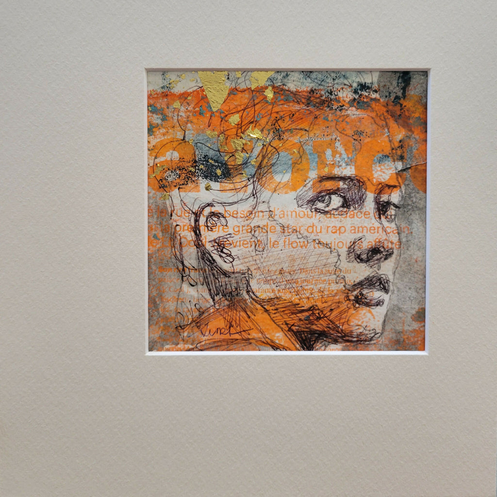 Tableau « la force » : visage stylisé orange et gris avec lettrage, cadre fin noir.