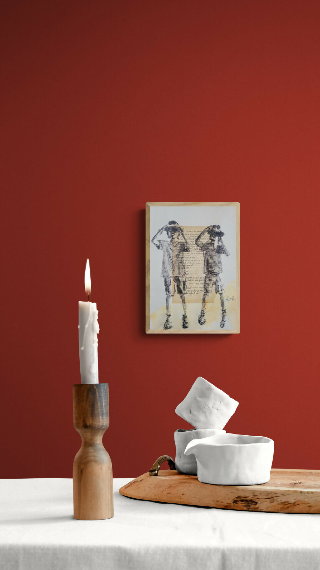 Tableau encadré « Les jumelles » : deux personnages en uniforme, style illustration.