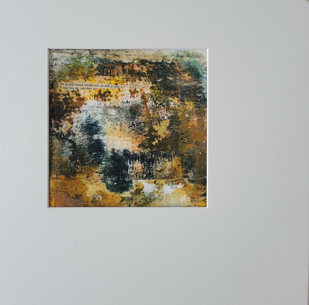 Tableau abstrait encadré, textures orange, bleu et vert sur fond clair