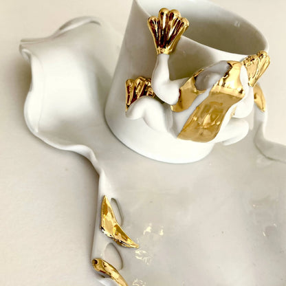 Tasse et soucoupe en porcelaine grenouille