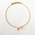 Collier fin à chaîne dorée avec pendentif rond