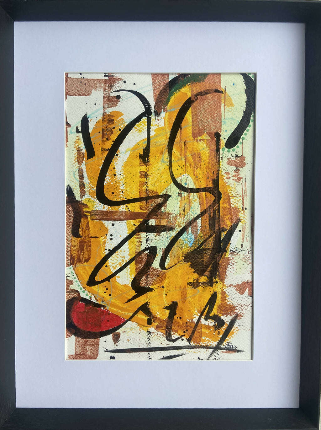 Tableau abstrait encadré, fond beige avec formes orange, vert et noir.