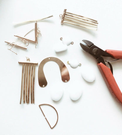 boucles doreille mobile blanc