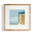 Tableau encadré avec vue mer, cadre en bois clair