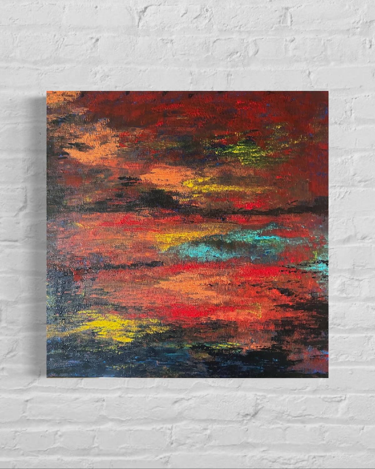 Tableau paysage abstrait rectangulaire rouge, orange, jaune et bleu, sur toile.
